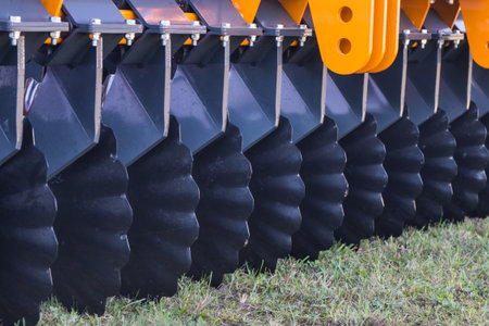 Black part of agricultural disk harrow. Concept of modern technology in agricultureの写真素材