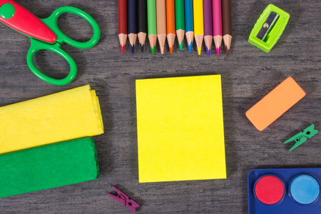 Different colorful stationery accessories and school supplies. Learning, drawing, writing, developing creativity. Kids motor skillsの写真素材