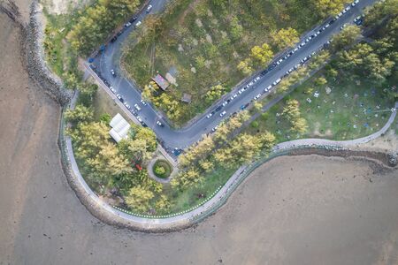 Saphan Hin public park with people while relax and exercise in Phuket town. Aerial view from flying droneの写真素材