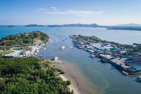 The big fishing boats standing at the sea in Phuket, Thailandの写真素材