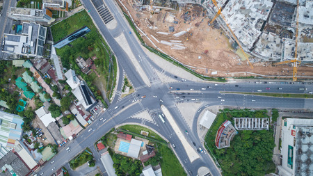 PHUKET, THAILAND - APRIL 26 : Top view Darasamuth intersection in Phuket town and car stop in traffic light in Phuket on April 26, 2017. Aerial view from flying droneのeditorial素材