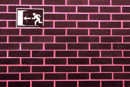 Wall with exit signの写真素材