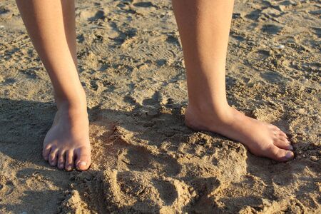 foot in beach