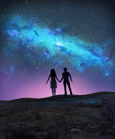 Concept of a young couple silhouetted, holding hands, looking at the Milky Way, galaxy, stars, 3d...