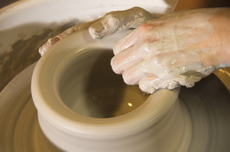 The hands of a potterの写真素材