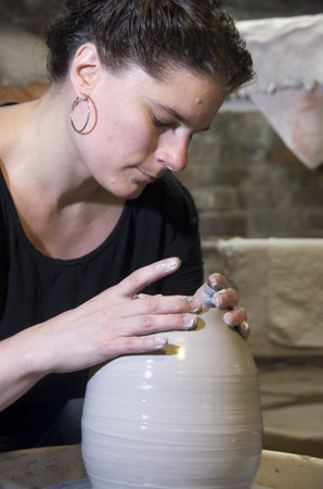 female potter at workの写真素材