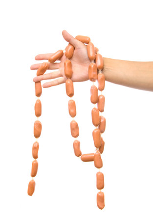 Sausages in hands on a white backgroundの写真素材