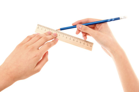 Brush for drawing in a human hand isolated on the white.の写真素材