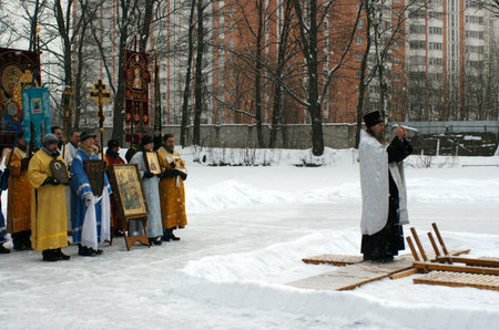 RUSSIA, MOSCOW - JAN 19: Orthodox Christians participate in a christening holiday "Solemn consecration of water for a christening holiday " January  19, 2009 in Moscow, Russiaのeditorial素材