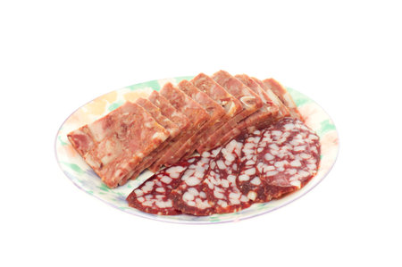 Sausage on a plate isolated on the whiteの写真素材