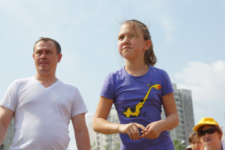 MOSCOW - JUNE 03: Participants of competitions take part in a darts in a Sports holiday "Starts of hopes" on JUNE03, 2011 in Moscowのeditorial素材