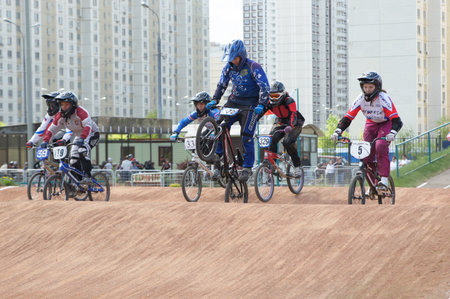 MOSCOW - MAY 09:  Young bicyclists participate in cycle racings devoted to a Victory Day holiday on MAY 09, 2011 in Moscowのeditorial素材
