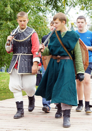 MOSCOW - SEPTEMBER 4: Medieval soldiers compete in battle on fight reconstruction on a holiday devoted to the City Day on September 4, 2011 in Moscow, Russia.のeditorial素材