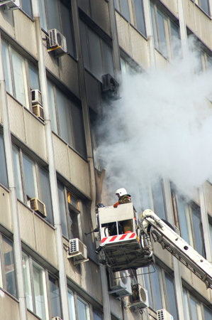 MOSCOW - MARCH 17:  Fire in many-storeyed office building. on MARCH 17, 2012 in Moscow, Novodmitrovskaya street.のeditorial素材