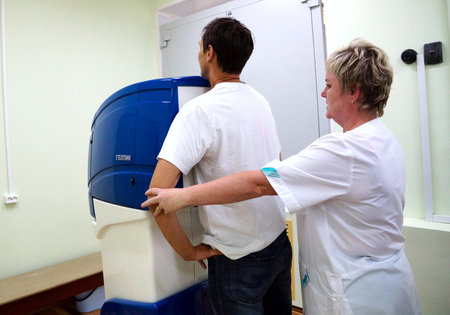 2012/07/19 Russia. Moscow. The patient during passing of fluorographic inspection in one of city hospitals.のeditorial素材