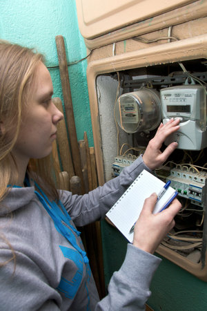 21 01 2013 Moscow. Write down indications of the multitariff electric meter.のeditorial素材