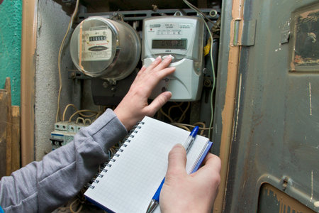 21 01 2013 Moscow. Write down indications of the multitariff electric meter.のeditorial素材