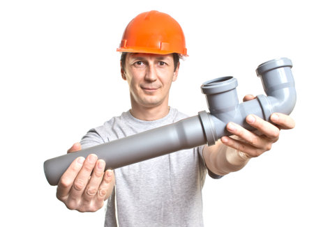 the young working plumber with the toolの写真素材