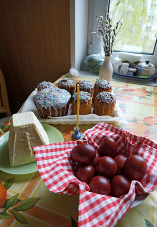 Easter eggs and Easter cakes on a table 