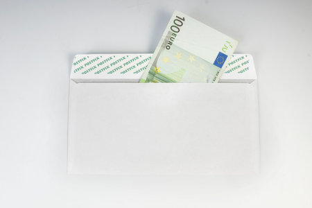 hundred euros in a white envelopeの写真素材