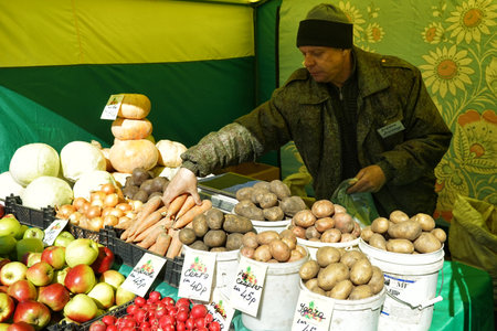 MOSCOW, RUSSIA - April 10, 2018: Street vending vegetables. Market weekend in Moscow.のeditorial素材