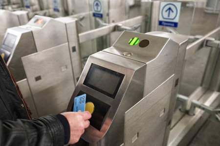 MOSCOW, RUSSIA - April 01, 2018: Passengers pass through turnstiles. The functioning of the subway in Moscow.のeditorial素材