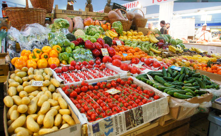 MOSCOW, RUSSIA - November 09, 2012: A table with vegetables and fruits. District food agricultural market in Moscow.のeditorial素材