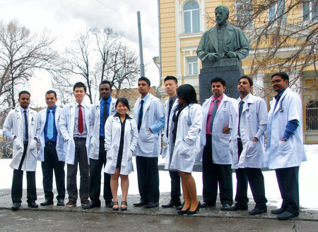 MOSCOW, RUSSIA - APRIL , 2012: Young doctors graduates are photographed next to medetsinskim University in Moscow.のeditorial素材