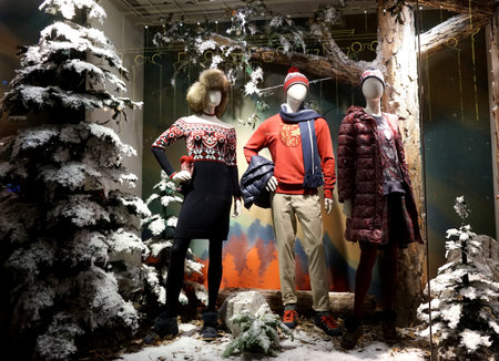 MOSCOW, RUSSIA - NOVEMBER, 2012:  Showcases with mannequins in clothing stores. Winter Christmas...