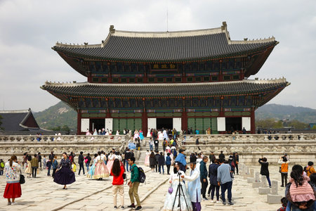 Seoul, South Korea - April 2018: Gyeongbokgung Palace, Tourists visiting the sights on the territory of the palace.のeditorial素材