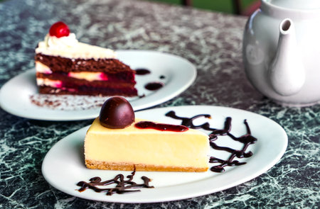 Cake on a white plate, a snapshot of real life.の写真素材