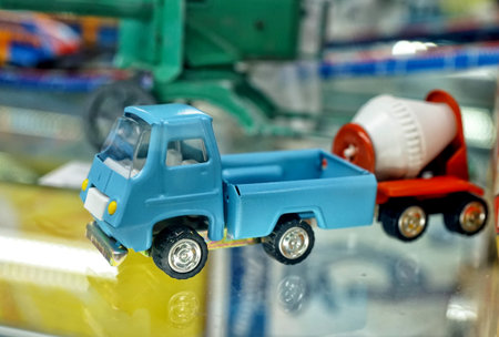 MOSCOW - MARCH, 2018: Metal, truck, concrete, mixer, Showcase with old toys in a retro toy store.のeditorial素材