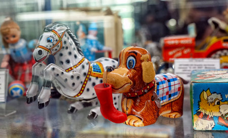 MOSCOW - MARCH, 2018: Metal horse and dog. Showcase with old toys in a retro toy store.のeditorial素材