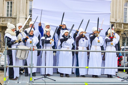 Warsaw - January 2013: Performance by artists, Light Forces with swords. Epiphany or Three Kings Day...