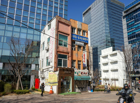 Seoul, Republic of Korea - March 2019: The variety of Seoul architecture. Old and new buildings nearby. Myeongdong District.のeditorial素材