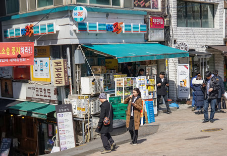 Seoul, Republic of Korea - March 2019: The variety of Seoul architecture. Old and new buildings nearby. Myeongdong District.のeditorial素材