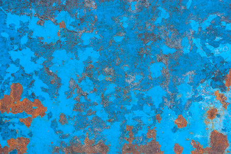 exture of rusty metal with paint green and blue traces