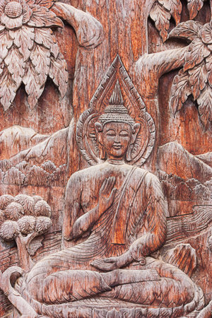 Wood carving about Buddhism in Thailand.の写真素材