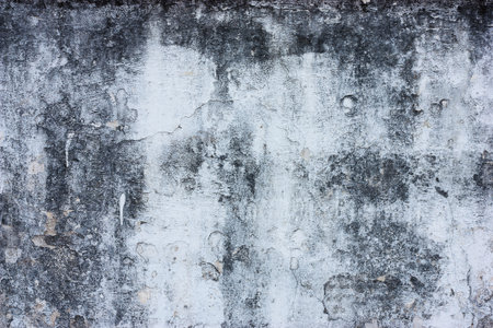 White walls are textured black dirt stains.の写真素材