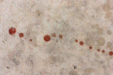 Cement floor with a drop of blood.Backgroundの写真素材