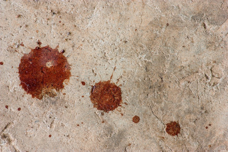 Cement floor with a drop of blood.Backgroundの写真素材