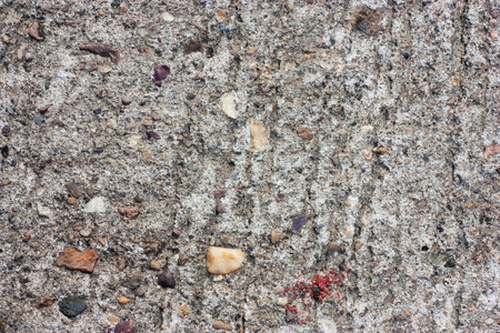 Details of the eroded surface of the old concrete wall.の写真素材