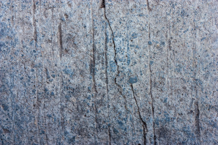 The old cracked cement and dirt and corrosionの写真素材