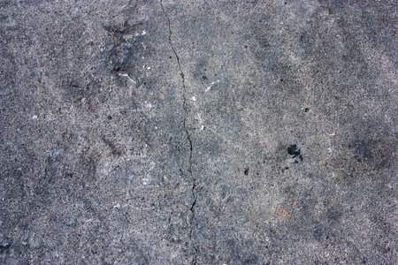 The old cracked cement and dirt and corrosionの写真素材