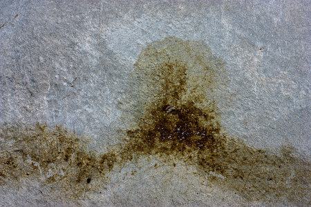 The old cracked cement and dirt and corrosion