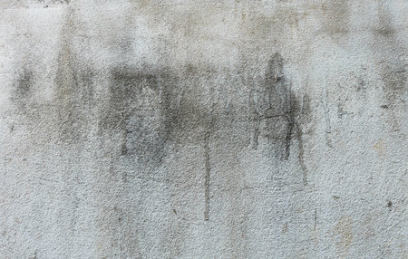 White walls are textured black dirt stainsの写真素材