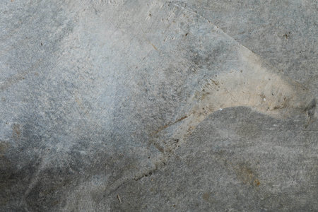 Details of the eroded surface of the old concrete wall.の写真素材