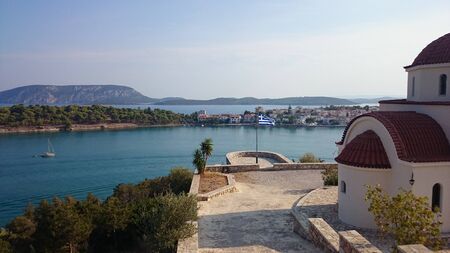 Ermioni, Greece, August 16, 2015 - View of the seaside village from the opposite hillのeditorial素材