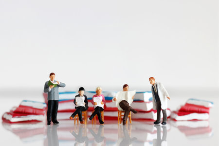 Miniatures people reading with book, education or business concept.
の写真素材