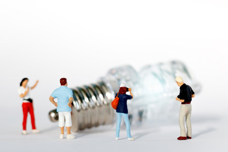 miniature people: photographer take a picture of  light bulb. idea business conceptの写真素材
